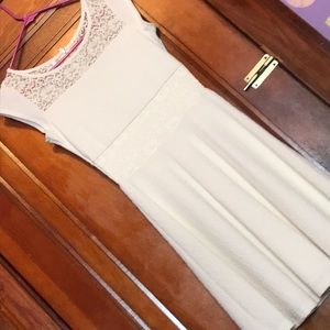 Maurice’s white circle dress.